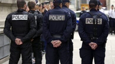 French Policemen Wait For The Arrival Of French Interior Minister Brice Hortefeux After A Meeting With French Police Forces In Paris